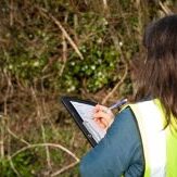ecologist-filling-out-paperwork